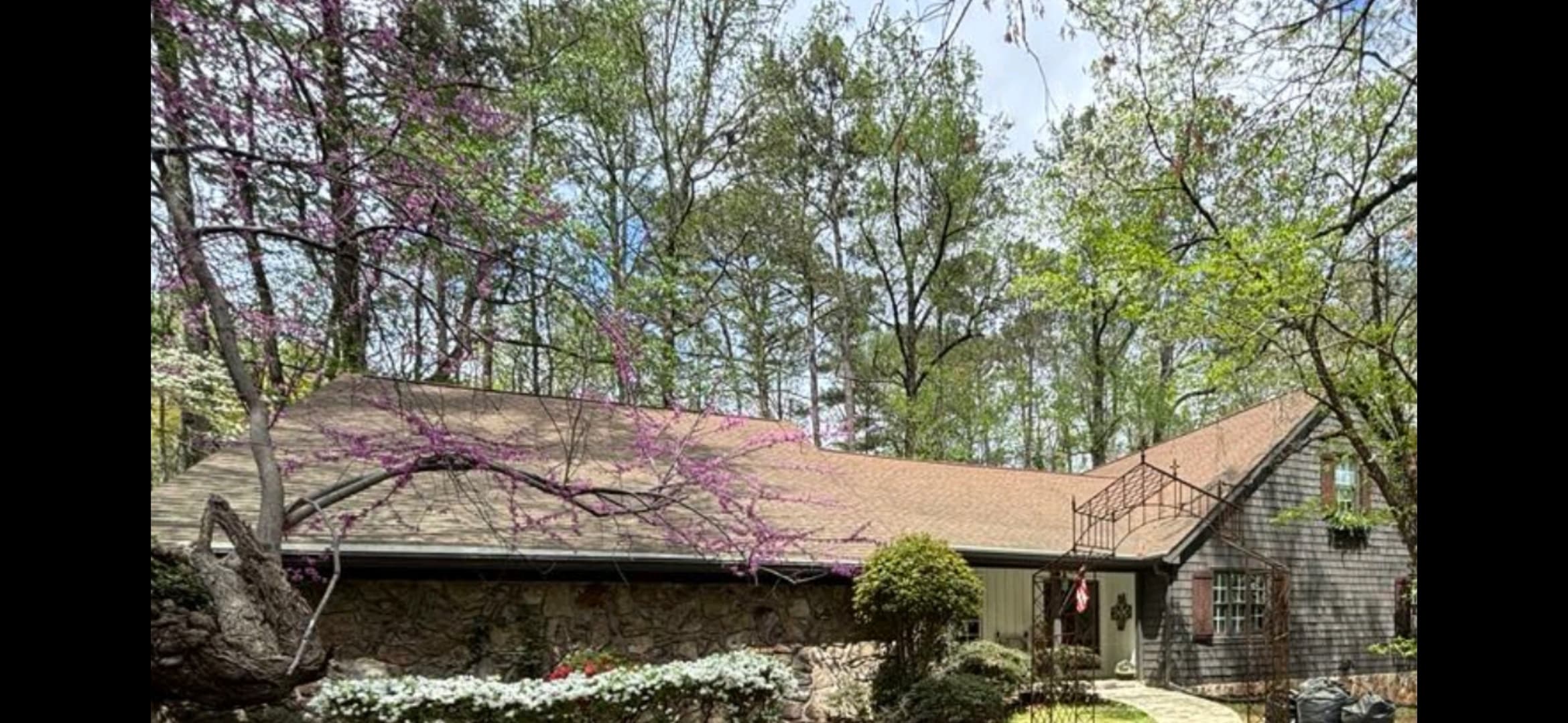 Atlanta home exterior being cleaned with hot water pressure washing